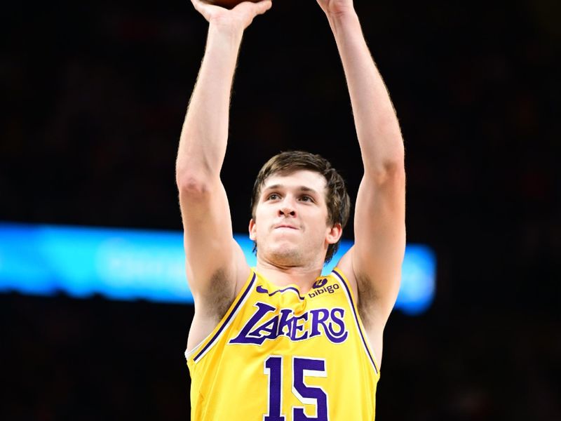 ATLANTA, GA - JANUARY 30: Austin Reaves #15 of the Los Angeles Lakers shoots the ball during the game  against the Atlanta Hawks on January 30, 2024 at State Farm Arena in Atlanta, Georgia.  NOTE TO USER: User expressly acknowledges and agrees that, by downloading and/or using this Photograph, user is consenting to the terms and conditions of the Getty Images License Agreement. Mandatory Copyright Notice: Copyright 2024 NBAE (Photo by Adam Hagy/NBAE via Getty Images)