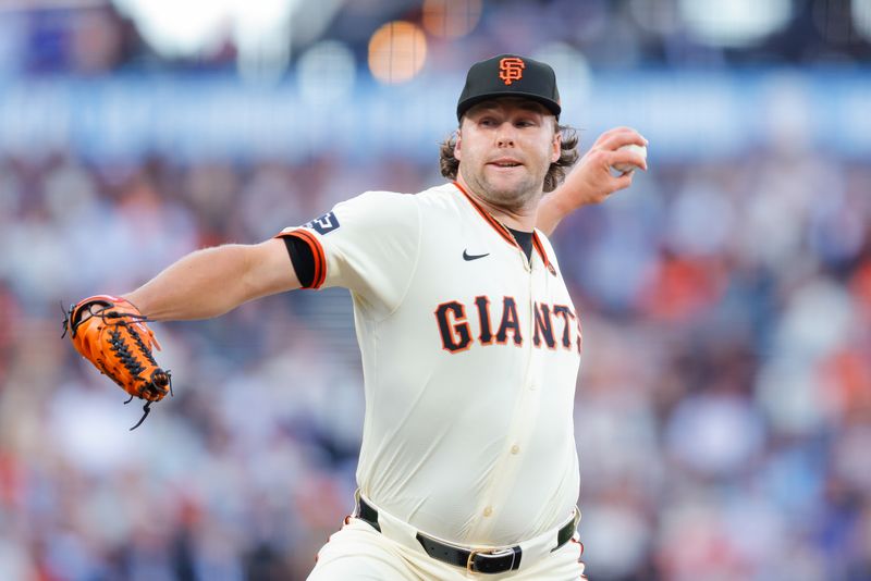 Jun 24, 2024; San Francisco, California, USA; San Francisco Giants pitcher Erik Miller throws a pitch during the first inning against the Chicago Cubs at Oracle Park. All Giants players wore the number 24 in honor of Giants former player Willie Mays. Mandatory Credit: Sergio Estrada-USA TODAY Sports