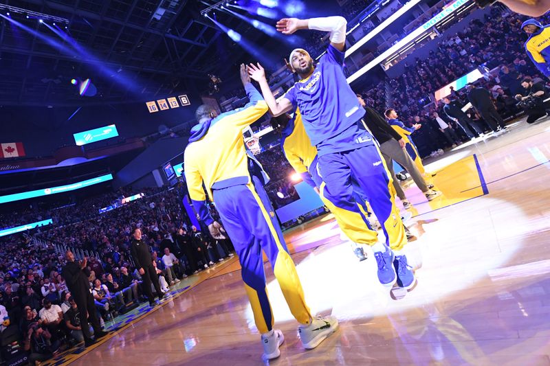 SAN FRANCISCO, CA - OCTOBER 30: Moses Moody #4 of the Golden State Warriors is introduced before the game against the New Orleans Pelicans on October 30, 2024 at Chase Center in San Francisco, California. NOTE TO USER: User expressly acknowledges and agrees that, by downloading and or using this photograph, user is consenting to the terms and conditions of Getty Images License Agreement. Mandatory Copyright Notice: Copyright 2024 NBAE (Photo by Noah Graham/NBAE via Getty Images)