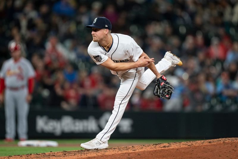 Apr 21, 2023; Seattle, Washington, USA; Seattle Mariners reliever Trevor Gott (30) delivers a pitch during the seventh inning against the St. Louis Cardinals at T-Mobile Park. Mandatory Credit: Stephen Brashear-USA TODAY Sports