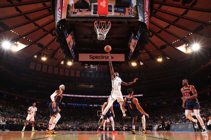 NEW YORK, NY - NOVEMBER 15: Dorian Finney-Smith #28 of the Brooklyn Nets drives to the basket during the game against the New York Knicks during the Emirates NBA Cup game on November 15, 2024 at Madison Square Garden in New York City, New York.  NOTE TO USER: User expressly acknowledges and agrees that, by downloading and or using this photograph, User is consenting to the terms and conditions of the Getty Images License Agreement. Mandatory Copyright Notice: Copyright 2024 NBAE  (Photo by Nathaniel S. Butler/NBAE via Getty Images)