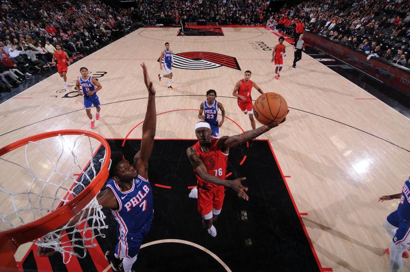 PORTLAND, OR - JANUARY 29: Taze Moore #76 of the Portland Trail Blazers shoots the ball during the game against the Philadelphia 76ers on January 29, 2024 at the Moda Center Arena in Portland, Oregon. NOTE TO USER: User expressly acknowledges and agrees that, by downloading and or using this photograph, user is consenting to the terms and conditions of the Getty Images License Agreement. Mandatory Copyright Notice: Copyright 2024 NBAE (Photo by Cameron Browne/NBAE via Getty Images)