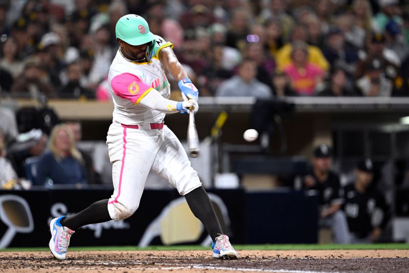 Sep 20, 2024; San Diego, California, USA; San Diego Padres shortstop Xander Bogaerts (2) hits a single against the Chicago White Sox during the sixth inning at Petco Park. Mandatory Credit: Orlando Ramirez-Imagn Images