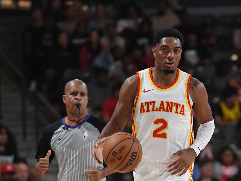 COLLEGE PARK, GA - OCTOBER 14: Trent Forrest #2 of the Atlanta Hawks dribbles the ball during the game against the New Orleans Pelicans on October 14, 2023 at Gateway Center Arena in College Park, Georgia.  NOTE TO USER: User expressly acknowledges and agrees that, by downloading and/or using this Photograph, user is consenting to the terms and conditions of the Getty Images License Agreement. Mandatory Copyright Notice: Copyright 2023 NBAE (Photo by Scott Cunningham/NBAE via Getty Images)