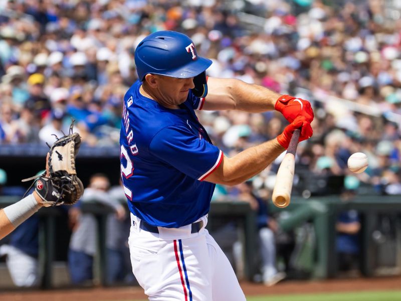 Mar 18, 2024; Surprise, Arizona, USA; Texas Rangers outfielder Wyatt Langford against the Seattle Mariners during a spring training baseball game at Surprise Stadium. Mandatory Credit: Mark J. Rebilas-USA TODAY Sports