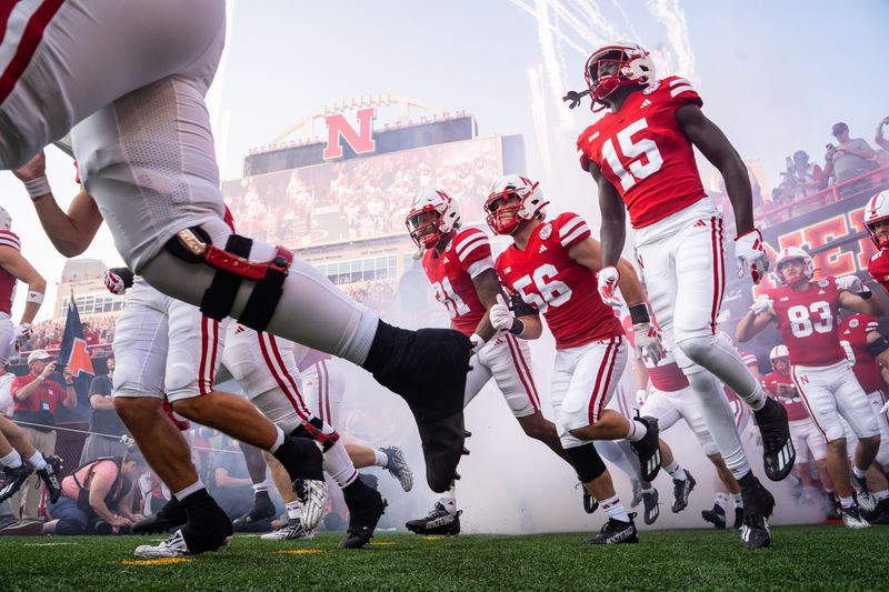 Sep 16, 2023; Lincoln, Nebraska, USA; The Nebraska Cornhuskers take the field before the game against the Northern Illinois Huskies at Memorial Stadium. Mandatory Credit: Dylan Widger-USA TODAY Sports