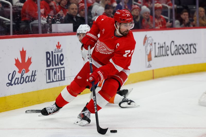 Feb 29, 2024; Detroit, Michigan, USA;  Detroit Red Wings center Dylan Larkin (71) skates with the puck in the second period against the New York Islanders at Little Caesars Arena. Mandatory Credit: Rick Osentoski-USA TODAY Sports