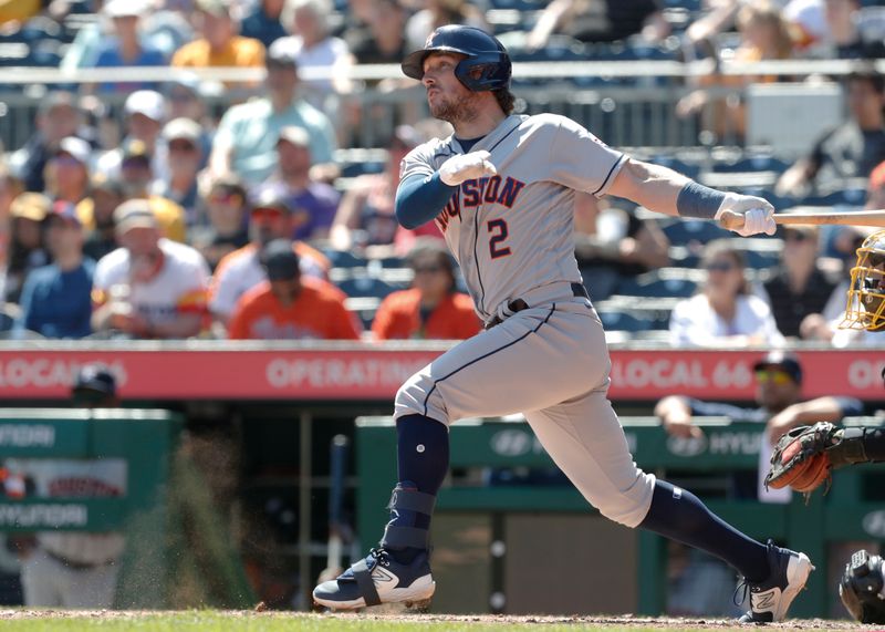 Apr 12, 2023; Pittsburgh, Pennsylvania, USA;  Houston Astros third baseman Alex Bregman (2) hits a three-run home run against the Pittsburgh Pirates during the seventh inning at PNC Park. Mandatory Credit: Charles LeClaire-USA TODAY Sports