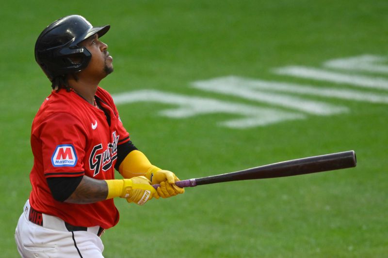 May 21, 2024; Cleveland, Ohio, USA; Cleveland Guardians third baseman Jose Ramirez (11) watches his two-run home run in the fifth inning against the New York Mets at Progressive Field. Mandatory Credit: David Richard-USA TODAY Sports
