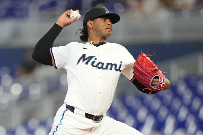 May 2, 2024; Miami, Florida, USA;  Miami Marlins starting pitcher Edward Cabrera (27) pitches in the first inning against the Colorado Rockies at loanDepot Park. Mandatory Credit: Jim Rassol-USA TODAY Sports