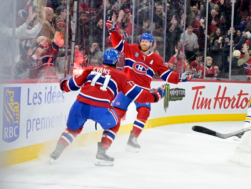 Mar 3, 2025; Montreal, Quebec, CAN; Montreal Canadiens defenseman Mike Matheson (8) celebrates with teammate forward Jake Evans (71) after scoring the game winning goal against the Buffalo Sabres during the overtime period at the Bell Centre. Mandatory Credit: Eric Bolte-Imagn Images