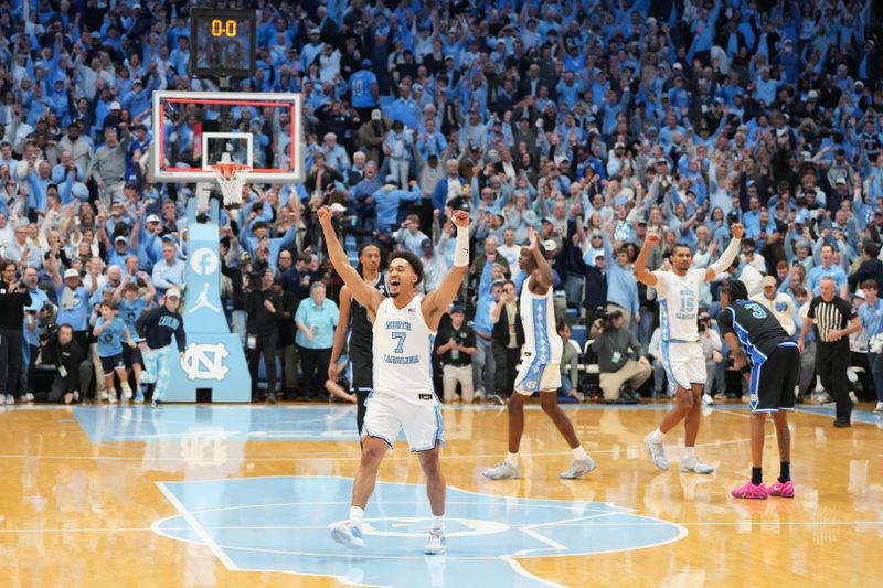 Feb 7, 2026; Chapel Hill, North Carolina, USA;  North Carolina Tar Heels guard Seth Trimble (7) and teammate celebrate after defeating Duke at Dean E. Smith Center. Mandatory Credit: Bob Donnan-Imagn Images