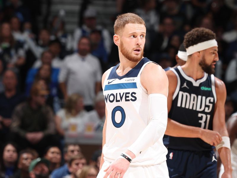 MINNEAPOLIS, MN -  OCTOBER 29: Donte DiVincenzo #0 of the Minnesota Timberwolves looks on during the game against the Dallas Mavericks on October 29, 2024 at Target Center in Minneapolis, Minnesota. NOTE TO USER: User expressly acknowledges and agrees that, by downloading and or using this Photograph, user is consenting to the terms and conditions of the Getty Images License Agreement. Mandatory Copyright Notice: Copyright 2024 NBAE (Photo by David Sherman/NBAE via Getty Images)