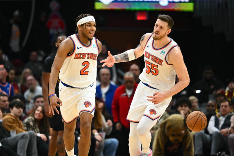 CLEVELAND, OHIO - MARCH 03: Isaiah Hartenstein #55 and Miles McBride #2 of the New York Knicks celebrate after McBride scored in the final seconds of the game against the Cleveland Cavaliers at Rocket Mortgage Fieldhouse on March 03, 2024 in Cleveland, Ohio. The Knicks defeated the Cavaliers 107-98. NOTE TO USER: User expressly acknowledges and agrees that, by downloading and or using this photograph, User is consenting to the terms and conditions of the Getty Images License Agreement. (Photo by Jason Miller/Getty Images)