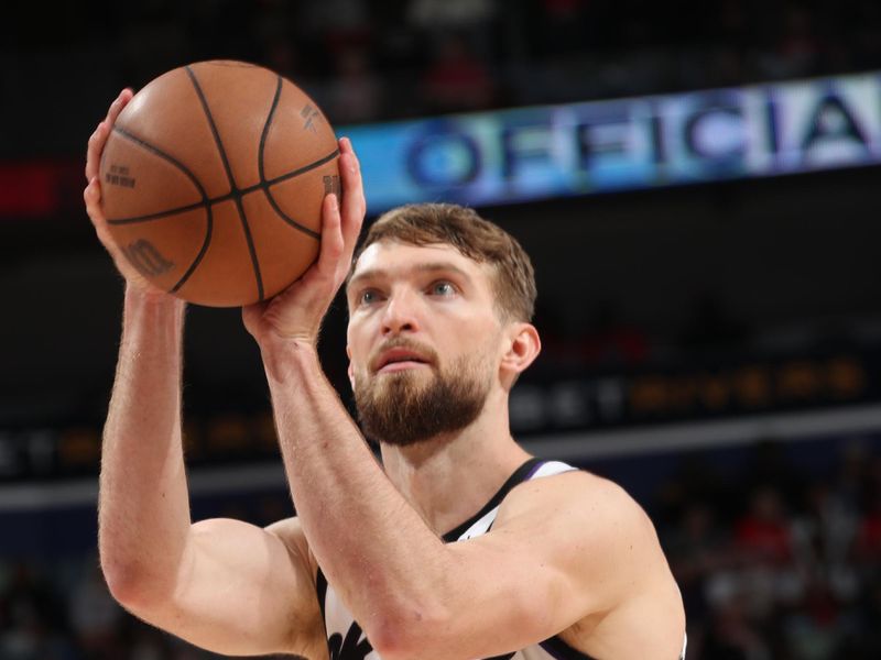 NEW ORLEANS, LA - APRIL 19: Domantas Sabonis #10 of the Sacramento Kings shoots a free throw during the game against the New Orleans Pelicans during the 2024 NBA Play-In Tournament on April 19, 2024 at the Smoothie King Center in New Orleans, Louisiana. NOTE TO USER: User expressly acknowledges and agrees that, by downloading and or using this Photograph, user is consenting to the terms and conditions of the Getty Images License Agreement. Mandatory Copyright Notice: Copyright 2024 NBAE (Photo by Layne Murdoch Jr./NBAE via Getty Images)