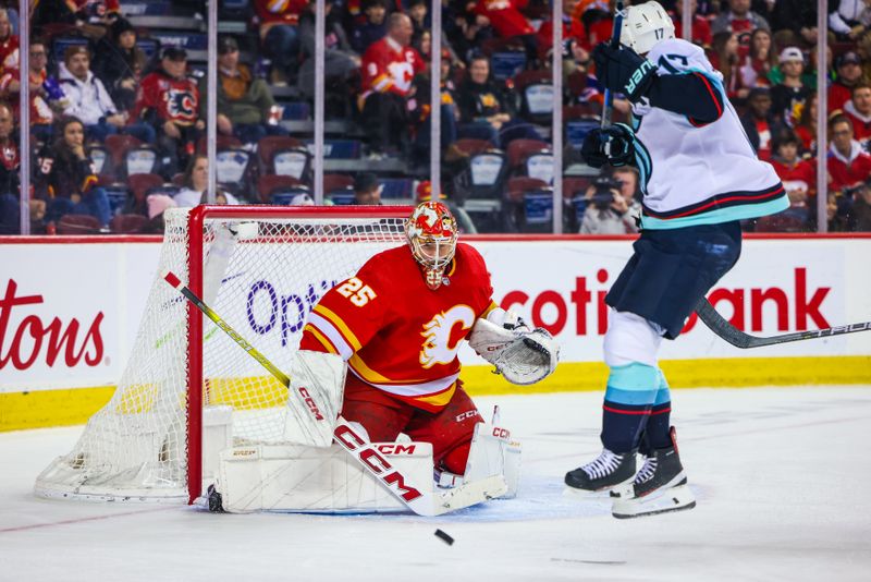 Mar 4, 2024; Calgary, Alberta, CAN; Seattle Kraken center Jaden Schwartz (17) skate blade comes off in front of Calgary Flames goaltender Jacob Markstrom (25) during the third period at Scotiabank Saddledome. Mandatory Credit: Sergei Belski-USA TODAY Sports