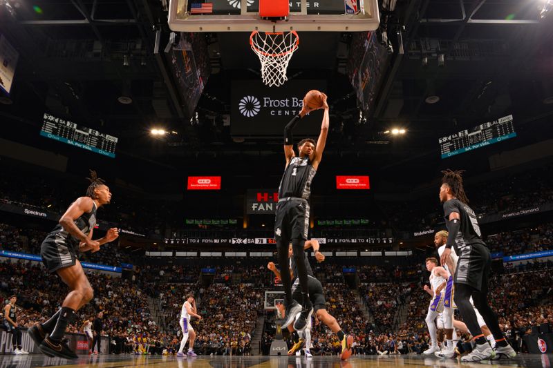 SAN ANTONIO, TX - NOVEMBER 15: Victor Wembanyama #1 of the San Antonio Spurs goes up for the rebound during the game against the Los Angeles Lakers during the Emirates NBA Cup game on November 15, 2024 at the Frost Bank Center in San Antonio, Texas. NOTE TO USER: User expressly acknowledges and agrees that, by downloading and or using this photograph, user is consenting to the terms and conditions of the Getty Images License Agreement. Mandatory Copyright Notice: Copyright 2024 NBAE (Photos by Jesse D. Garrabrant/NBAE via Getty Images)