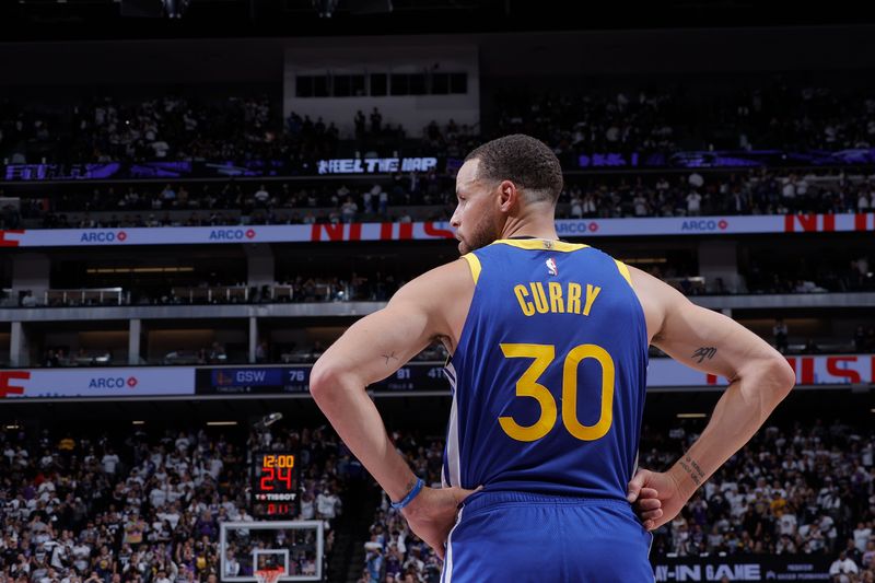 SACRAMENTO, CA - APRIL 16: Stephen Curry #30 of the Golden State Warriors looks on during the game against the Sacramento Kings during the 2024 Play-In Tournament on April 16, 2024 at Golden 1 Center in Sacramento, California. NOTE TO USER: User expressly acknowledges and agrees that, by downloading and or using this Photograph, user is consenting to the terms and conditions of the Getty Images License Agreement. Mandatory Copyright Notice: Copyright 2024 NBAE (Photo by Rocky Widner/NBAE via Getty Images)