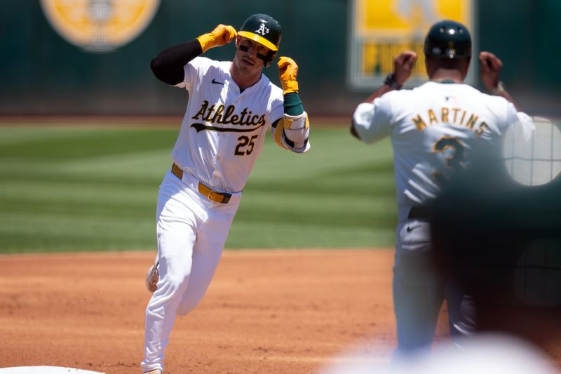 Jul 6, 2024; Oakland, California, USA; Oakland Athletics designated hitter Brent Rooker (25) celebrates his three-run home run against the Baltimore Orioles during the first inning at Oakland-Alameda County Coliseum. Mandatory Credit: D. Ross Cameron-USA TODAY Sports