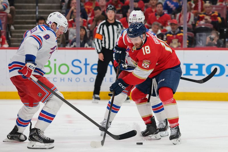 Apr 13, 2026; Sunrise, Florida, USA; Florida Panthers left wing Noah Gregor (18) moves the puck against New York Rangers center J.T. Miller (8) during the third period at Amerant Bank Arena. Mandatory Credit: Sam Navarro-Imagn Images Apr 13, 2026; Sunrise, Florida, USA; Florida Panthers left wing Noah Gregor (18) moves the puck against New York Rangers center J.T. Miller (8) during the third period at Amerant Bank Arena. Mandatory Credit: Sam Navarro-Imagn Images