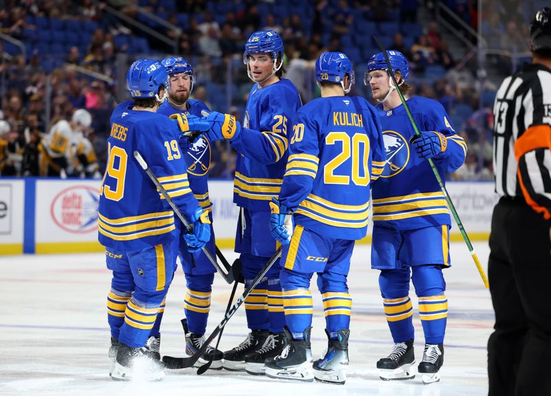 Sep 21, 2024; Buffalo, New York, USA;  Buffalo Sabres defenseman Owen Power (25) celebrates his goal with teammates during the second period against the Pittsburgh Penguins at KeyBank Center. Mandatory Credit: Timothy T. Ludwig-Imagn Images