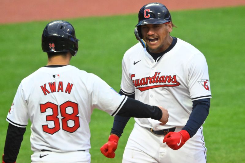 Apr 20, 2024; Cleveland, Ohio, USA; Cleveland Guardians designated hitter Josh Naylor (22) celebrates his two-run home run with left fielder Steven Kwan (38) in the fifth inning against the Oakland Athletics at Progressive Field. Mandatory Credit: David Richard-USA TODAY Sports