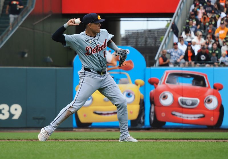 Aug 11, 2024; San Francisco, California, USA; Detroit Tigers third baseman Gio Urshela (13) throws the ball to second base to start a double play against the San Francisco Giants during the sixth inning at Oracle Park. Mandatory Credit: Kelley L Cox-USA TODAY Sports