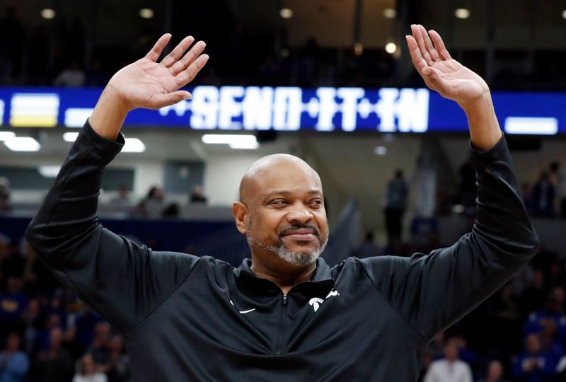 Jan 25, 2023; Pittsburgh, Pennsylvania, USA;  Pittsburgh Panthers former small forward Jerome Lane waves to the crowd as he is honored on the thirty-fifth anniversary of his backboard shattering dunk against Providence College. Lane was honored during a first half time-out against the Wake Forest Demon Deacons at the Petersen Events Center. Mandatory Credit: Charles LeClaire-USA TODAY Sports