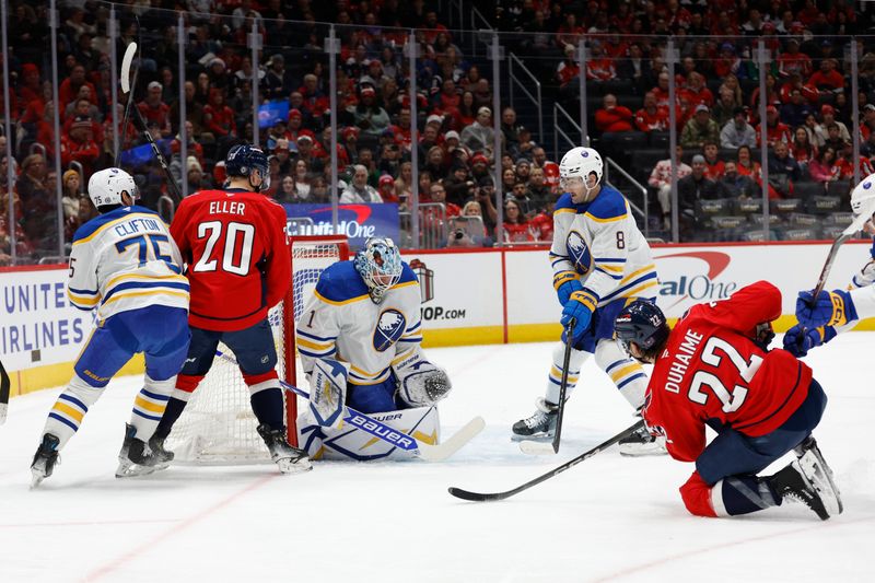 Dec 14, 2024; Washington, District of Columbia, USA; Buffalo Sabres goaltender Ukko-Pekka Luukkonen (1) makes a save on Washington Capitals right wing Brandon Duhaime (22) in the first period at Capital One Arena. Mandatory Credit: Geoff Burke-Imagn Images