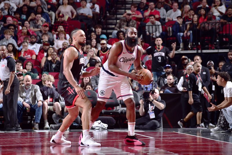 HOUSTON, TX - NOVEMBER 15: James Harden #1 of the LA Clippers looks to pass the ball during the game against the Houston Rockets during the Emirates NBA Cup game on November 15, 2024 at the Toyota Center in Houston, Texas. NOTE TO USER: User expressly acknowledges and agrees that, by downloading and or using this photograph, User is consenting to the terms and conditions of the Getty Images License Agreement. Mandatory Copyright Notice: Copyright 2024 NBAE (Photo by Logan Riely/NBAE via Getty Images)