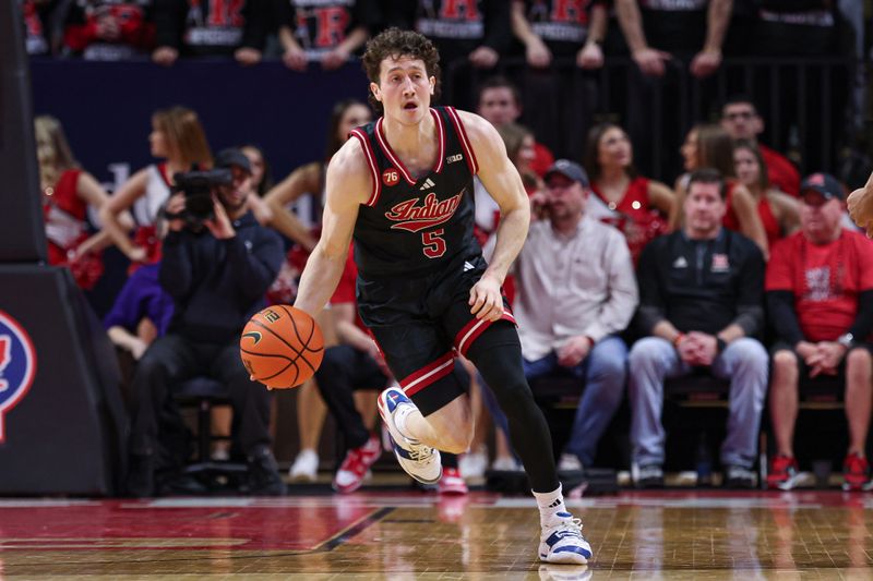 Jan 23, 2026; Piscataway, New Jersey, USA; Indiana Hoosiers guard Conor Enright (5) dribbles up court during the first half against the Rutgers Scarlet Knights at Jersey Mike's Arena. Mandatory Credit: Vincent Carchietta-Imagn Images