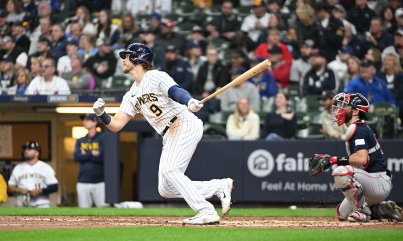 Apr 23, 2023; Milwaukee, Wisconsin, USA; Milwaukee Brewers third baseman Brian Anderson (9) watches his home run against the Boston Red Sox during the fourth inning. Mandatory Credit: Michael McLoone-USA TODAY Sports