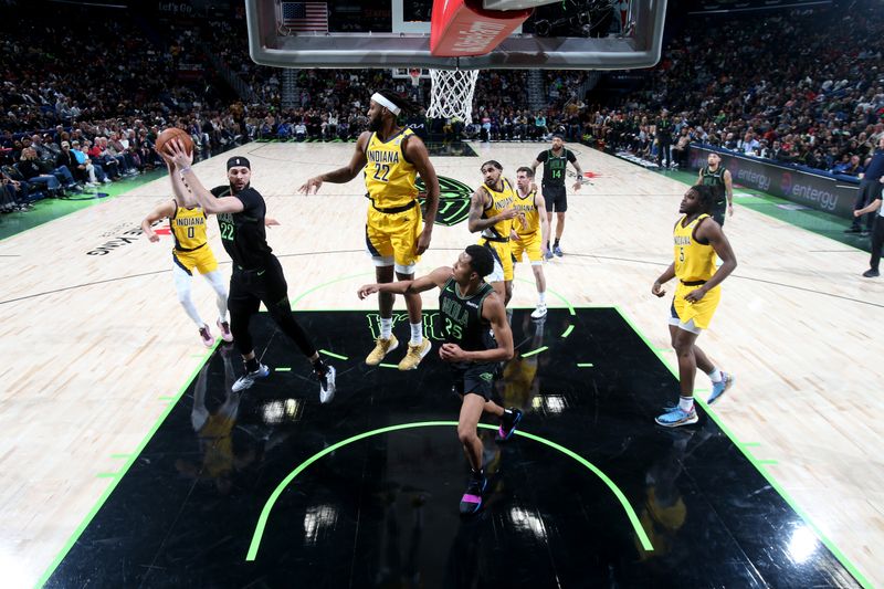 NEW ORLEANS, LA - MARCH 1:  Larry Nance Jr. #22 of the New Orleans Pelicans grabs a rebound during the game against the Indiana Pacers on March 1, 2024 at the Smoothie King Center in New Orleans, Louisiana. NOTE TO USER: User expressly acknowledges and agrees that, by downloading and or using this Photograph, user is consenting to the terms and conditions of the Getty Images License Agreement. Mandatory Copyright Notice: Copyright 2024 NBAE (Photo by Layne Murdoch Jr./NBAE via Getty Images)