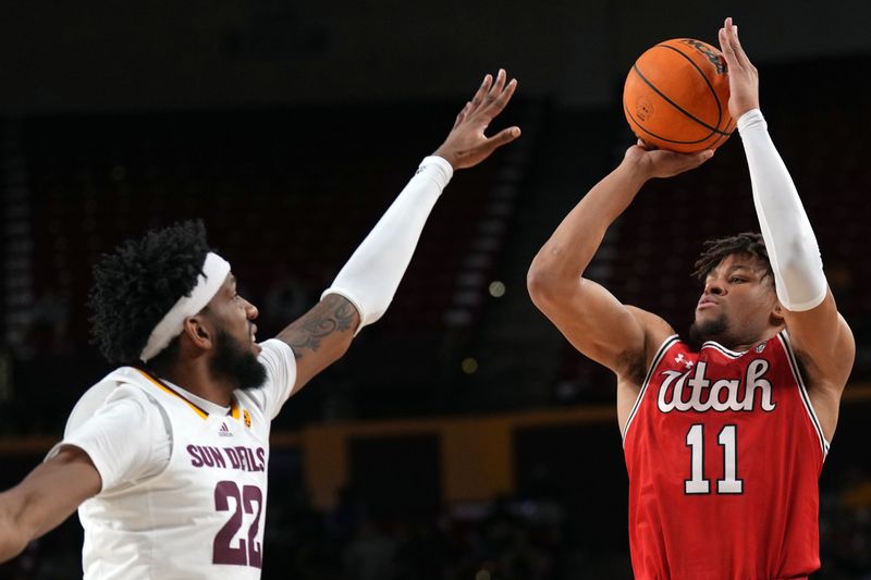 Feb 18, 2023; Tempe, Arizona, USA; Utah Utes guard Wilguens Exacte Jr. (11) shoots over Arizona State Sun Devils forward Warren Washington (22) during the first half at Desert Financial Arena. Mandatory Credit: Joe Camporeale-USA TODAY Sports