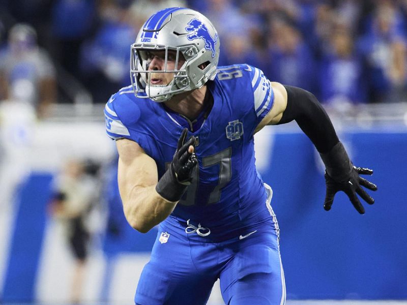 Detroit Lions defensive end Aidan Hutchinson (97) pursues a play on defense against the Los Angeles Rams during an NFL wild-card playoff football game, Saturday, Jan. 14, 2024, in Detroit. (AP Photo/Rick Osentoski)