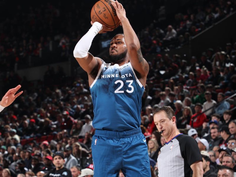 PORTLAND, OR - FEBRUARY 15: Monte Morris #23 of the Minnesota Timberwolves shoots the ball during the game against the Portland Trail Blazers on February 15, 2024 at the Moda Center Arena in Portland, Oregon. NOTE TO USER: User expressly acknowledges and agrees that, by downloading and or using this photograph, user is consenting to the terms and conditions of the Getty Images License Agreement. Mandatory Copyright Notice: Copyright 2024 NBAE (Photo by Cameron Browne/NBAE via Getty Images)