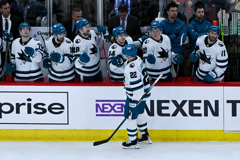 Jan 16, 2024; Chicago, Illinois, USA; San Jose Sharks center Ryan Carpenter (22) celebrates with teammates after scoring against the Chicago Blackhawks during the third period at United Center. Mandatory Credit: Matt Marton-USA TODAY Sports