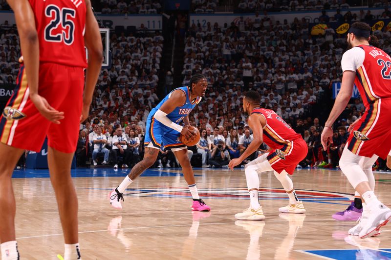 OKLAHOMA CITY, OK - APRIL 24: Jalen Williams #8 of the Oklahoma City Thunder dribbles the ball during the game against the New Orleans Pelicans during Round 1 Game 2 of the 2024 NBA Playoffs on April 24, 2024 at Paycom Arena in Oklahoma City, Oklahoma. NOTE TO USER: User expressly acknowledges and agrees that, by downloading and or using this photograph, User is consenting to the terms and conditions of the Getty Images License Agreement. Mandatory Copyright Notice: Copyright 2024 NBAE (Photo by Zach Beeker/NBAE via Getty Images)