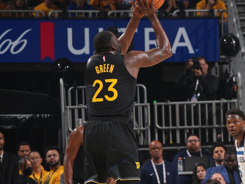 SAN FRANCISCO, CA - MAY 12:   Draymond Green #23 of the Golden State Warriors shoots a three point basket during the game against the Minnesota Timberwolves  during Round 2 Game 4 of the 2025 NBA Playoffs on May 12, 2025 at Chase Center in San Francisco, California. NOTE TO USER: User expressly acknowledges and agrees that, by downloading and or using this photograph, user is consenting to the terms and conditions of Getty Images License Agreement. Mandatory Copyright Notice: Copyright 2025 NBAE (Photo by Jesse D. Garrabrant/NBAE via Getty Images)