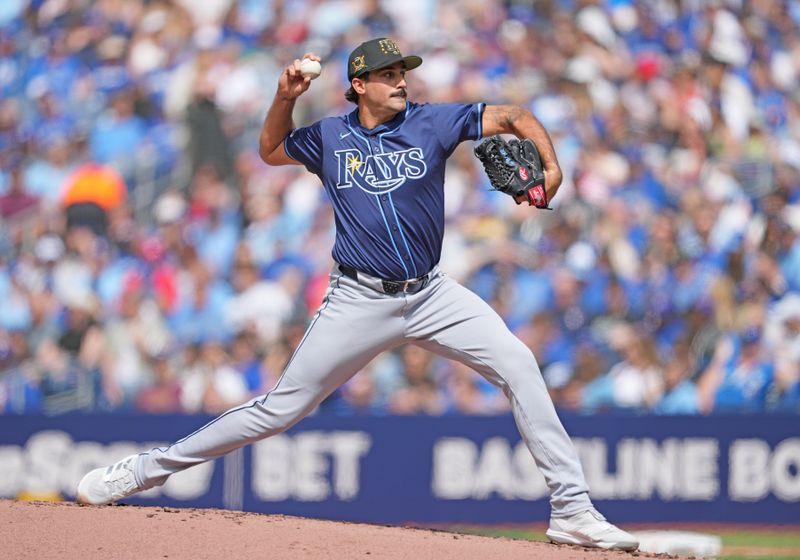 May 18, 2024; Toronto, Ontario, CAN; Tampa Bay Rays starting pitcher Zach Eflin (24) throws a pitch during the first inning against the Toronto Blue Jays at Rogers Centre. Mandatory Credit: Nick Turchiaro-USA TODAY Sports