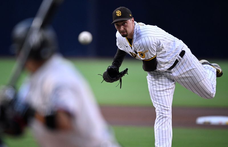 Aug 22, 2023; San Diego, California, USA; San Diego Padres starting pitcher Blake Snell (4) throws a pitch against the Miami Marlins during the first inning at Petco Park. Mandatory Credit: Orlando Ramirez-USA TODAY Sports