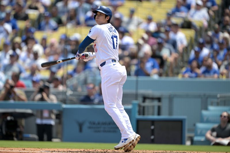 Apr 17, 2024; Los Angeles, California, USA; Los Angeles Dodgers designated hitter player Shohei Ohtani (17) flies out in the third inning against the Washington Nationals at Dodger Stadium. Mandatory Credit: Jayne Kamin-Oncea-USA TODAY Sports