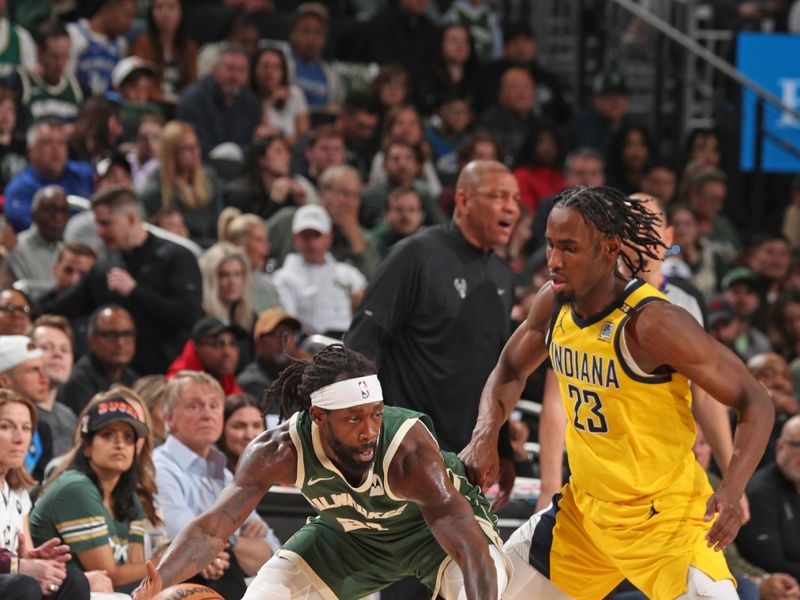 MILWAUKEE, WI - APRIL 21: Patrick Beverley #21 of the Milwaukee Bucks dribbles the ball during the game against the Indiana Pacers during Round 1 Game 1 of the 2024 NBA Playoffs on April 21, 2024 at the Fiserv Forum Center in Milwaukee, Wisconsin. NOTE TO USER: User expressly acknowledges and agrees that, by downloading and or using this Photograph, user is consenting to the terms and conditions of the Getty Images License Agreement. Mandatory Copyright Notice: Copyright 2024 NBAE (Photo by Gary Dineen/NBAE via Getty Images).