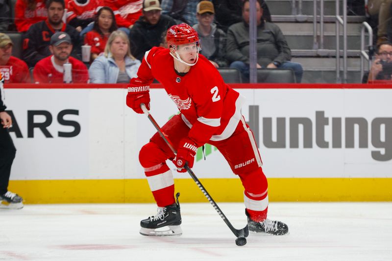 Dec 9, 2023; Detroit, Michigan, USA; Detroit Red Wings defenseman Olli Maatta (2) handles the puck during the first period at Little Caesars Arena. Mandatory Credit: Brian Bradshaw Sevald-USA TODAY Sports