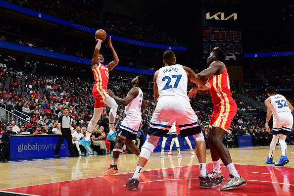 ATLANTA, GA - OCTOBER 30: De'Andre Hunter #12 of the Atlanta Hawks drives to the basket during the game against the Minnesota Timberwolves on October 30, 2023 at State Farm Arena in Atlanta, Georgia.  NOTE TO USER: User expressly acknowledges and agrees that, by downloading and/or using this Photograph, user is consenting to the terms and conditions of the Getty Images License Agreement. Mandatory Copyright Notice: Copyright 2023 NBAE (Photo by Scott Cunningham/NBAE via Getty Images)