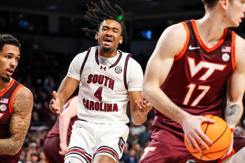 Dec 2, 2025; Columbia, South Carolina, USA; South Carolina Gamecocks guard Kobe Knox (4) reacts to a play against the Virginia Tech Hokies in the first half at Colonial Life Arena. Mandatory Credit: Jeff Blake-Imagn Images