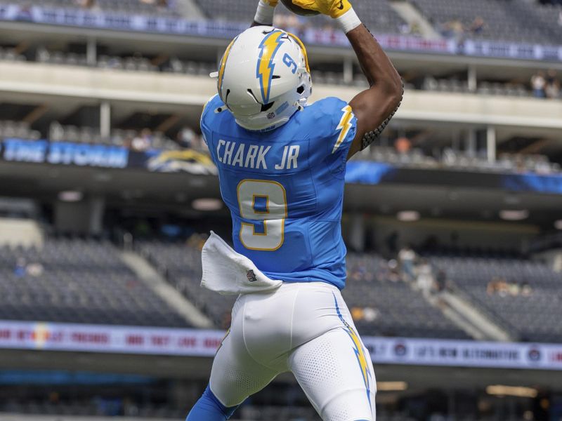 Los Angeles Chargers wide receiver DJ Clark (9) warms up before playing against the Seattle Seahawks in an NFL preseason football game, Saturday, Aug.10, 2024, in Inglewood, Calif. (AP Photo/Jeff Lewis)