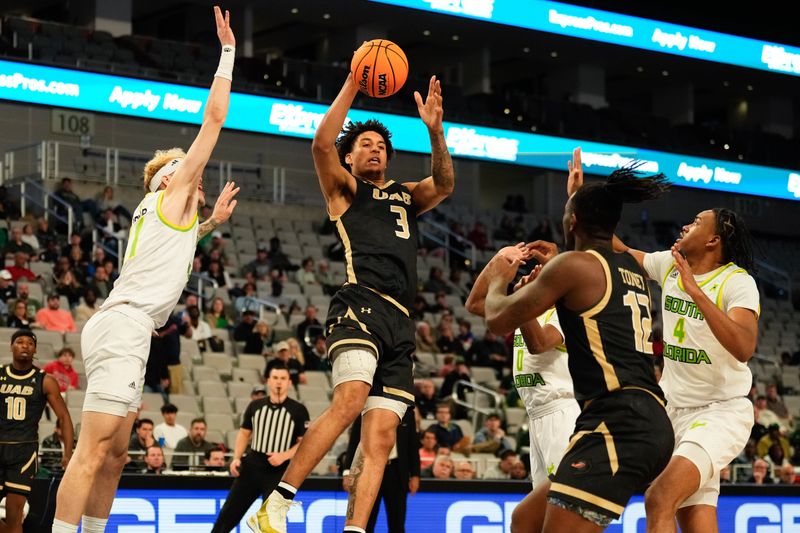 Mar 16, 2024; Fort Worth, TX, USA;  UAB Blazers forward Yaxel Lendeborg (3) makes a pass against South Florida Bulls forward Kasean Pryor (11) during the first half at Dickies Arena. Mandatory Credit: Chris Jones-USA TODAY Sports