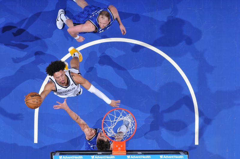 ORLANDO, FL - MARCH 13: Jalen Wilson #22 of the Brooklyn Nets drives to the basket during the game against the Orlando Magic on March 13, 2024 at the Kia Center in Orlando, Florida. NOTE TO USER: User expressly acknowledges and agrees that, by downloading and or using this photograph, User is consenting to the terms and conditions of the Getty Images License Agreement. Mandatory Copyright Notice: Copyright 2024 NBAE (Photo by Fernando Medina/NBAE via Getty Images)