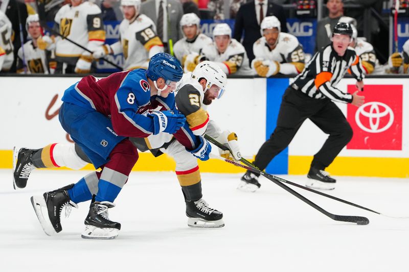 Oct 31, 2025; Las Vegas, Nevada, USA; Vegas Golden Knights left wing Brandon Saad (20) skates against Colorado Avalanche defenseman Cale Makar (8) during the second period at T-Mobile Arena. Mandatory Credit: Stephen R. Sylvanie-Imagn Images